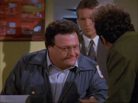 Newman, the mail-carrier character from Seinfeld, in uniform